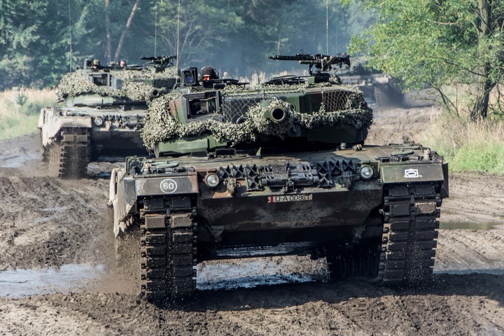 Handout photos of the Polish Defense Ministry shows Leopard 2A4 tanks at the military rest range in Zagan, Poland, Sept.15, 2013. (Polish Defense Ministry via AP)