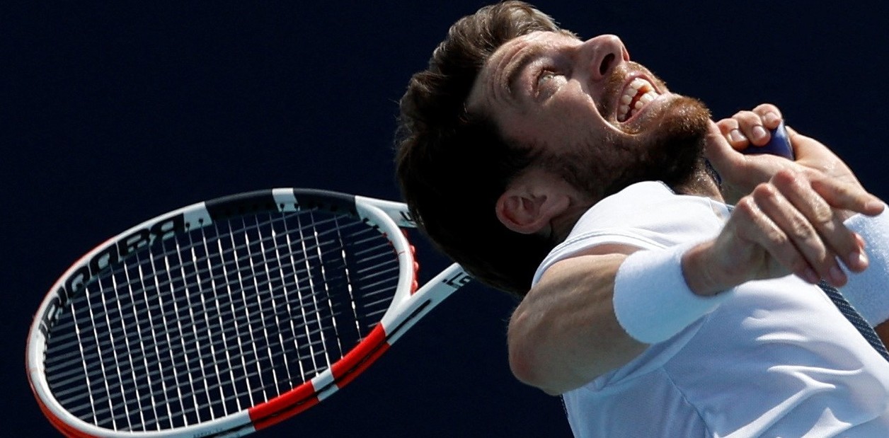 Mar 20, 2023; Miami, Florida, US; Cam Norrie (GBR) serves during practice in preparation for the Miami Open at Hard Rock Stadium. Mandatory Credit: Geoff Burke-USA TODAY Sports