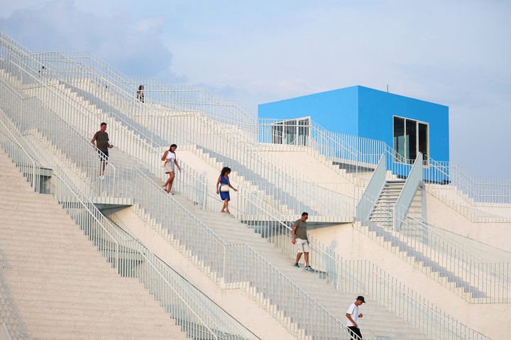 Tourists visit the redesigned pyramid that was formerly a museum built to honour late Communist dictator Enver Hoxha, in Tirana, Albania, August 18, 2023