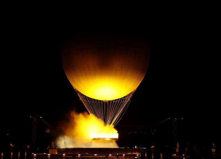 Paris 2024 Olympics - Opening Ceremony - Paris, France - July 26, 2024.
The Olympic cauldron is lit during the opening ceremony of the Paris 2024 Olympics. REUTERS/Mike Blake