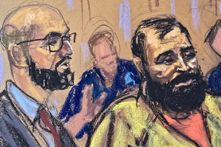 Mohammad Baqer Saad Dawood Al-Saadi, an Iraqi man accused of helping Iran-backed militia's plans for attacks in the United States and Europe, stands with his defense attorney Andrew Dalack during his arraignment in Manhattan federal court in New York City, U.S., June 1, 2026 in a courtroom sketch. REUTERS/Jane Rosenberg